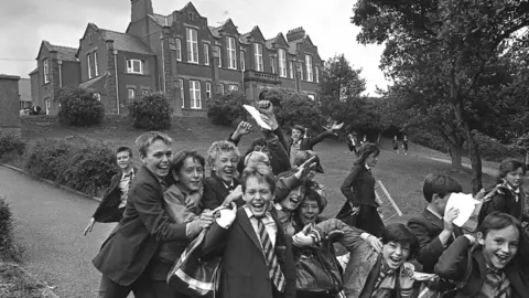 Getty Images Boy leaving Ysgol Penrallt, Pwllheli 1988