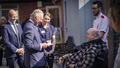 Marie Curie Prince Charles visiting Marie Curie hospice