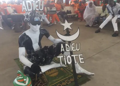 Alex Duval Smith Man in black and white facepaint