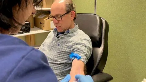 BBC Ronnie Helvey was given the all clear after blood test for circulatory tumours.