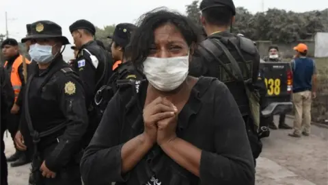 AFP A woman cries for her missing relatives during the search for victims in San Miguel Los Lotes, a village in Escuintla Department, about 35 km southwest of Guatemala City, on June 4, 2018