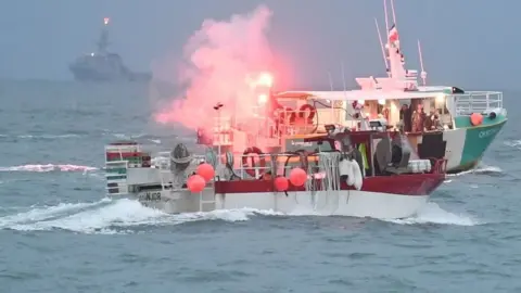 SWNS  A fishing boat off the coast of Jersey