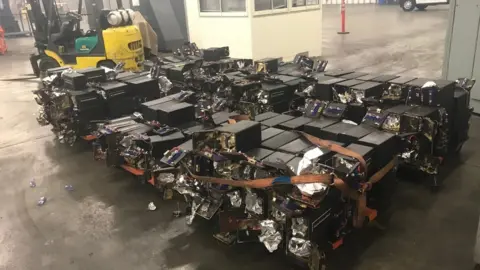 Australian Federal Police A collection of containers used to conceal the stash of crystal meth, heroine and cocaine