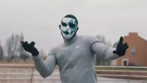 Essex Police Olusogo Ajewole wore a mask when performing in the videos