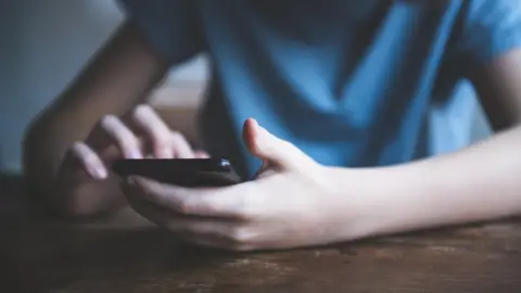 Getty Images Child on phone