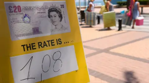 Getty Images Exchange rate board in Spain