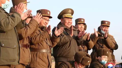 Reuters North Korean military staff clapping