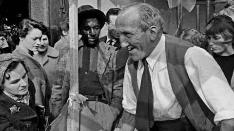 Market trader, Berwick Street Market, Soho, London, 1957