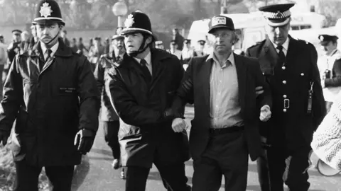 Manchester Daily Express/Getty Images Arthur Scargill is arrested during the miners strike