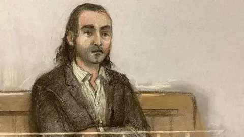 Elizabeth Cook/ PA Wire Court illustrator's drawing of Jozef Puska in the dock