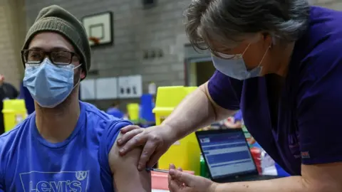 Getty Images Vaccination clinic on 30 dec in Pontllanfraith, Wales