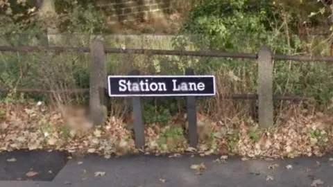 Google Street sign for Station Lane in Pontefract