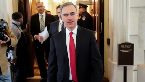 Reuters Pat Cipollone leaves Capitol Hill, December 2019