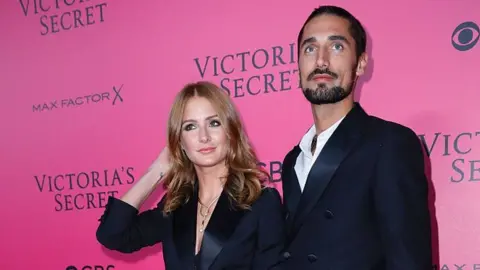 PATRICK KOVARIK/AFP/Getty Images Millie Mackintosh and and Hugo Taylor at the 2016 Victoria's Secret Fashion Show