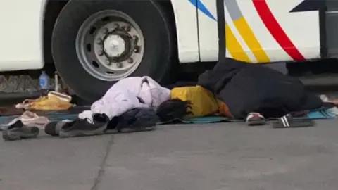 Mohamed Osman/ BBC People sleeping rough in Wadi Halfa