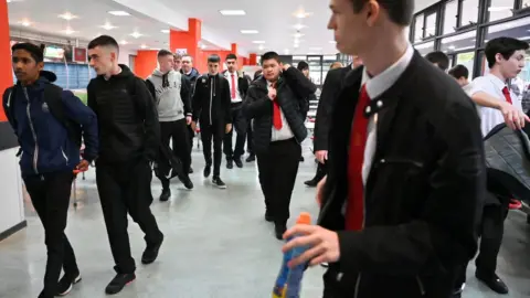 Pupils return to St Paul's High School for the first time since the start of the coronavirus lockdown nearly five months ago