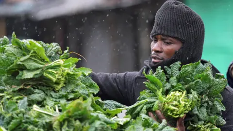 Nic Bothma/Reuters A vegetable vendor in Cape Town, South Africa - Monday 8 April 2024