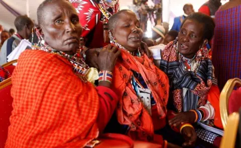 Reuters Maasai women mourn Kenya's Interior Minister Joseph Nkaissery before his burial ceremony in Ilbissil village of Kajiado county, Kenya, July 15, 2017.