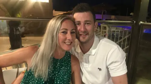 Adam Holmes Adam Holmes with his girlfriend