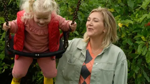 Anna Semenko with her daughter