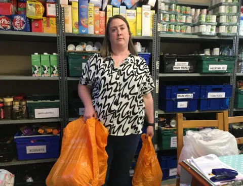 BBC Annie McCormack with food parcels