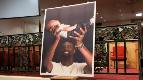 Reuters Tyre Nichols holding up his baby son