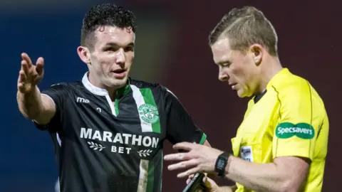 Hibs John McGinn with referee John Beaton