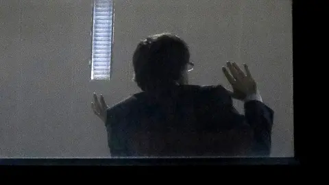 AFP Carles Puigdemont gestures inside the public prosecutor's office in Brussels, on November 5, 2017