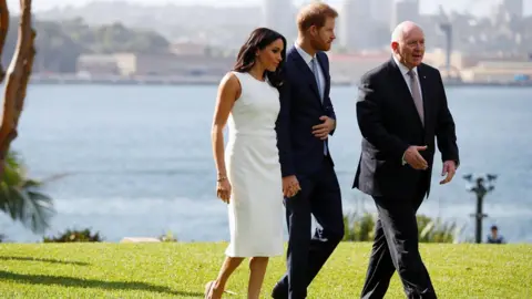 Reuters Prince Harry, Sir Peter Cosgrove and Meghan, the Duchess of Sussex