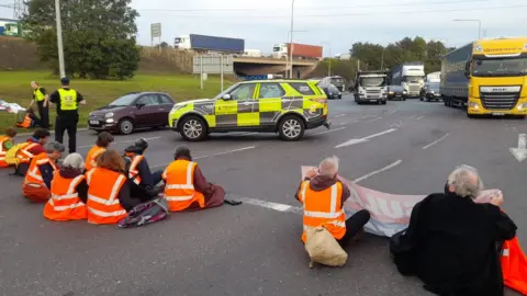 PA Media Insulate Britain protesters blocking the M25 near Thurrock