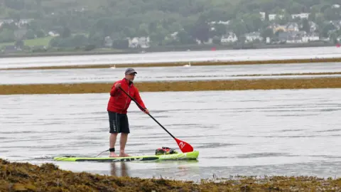 Peter Jolly Northpix Paddle boarder Carl Habrel