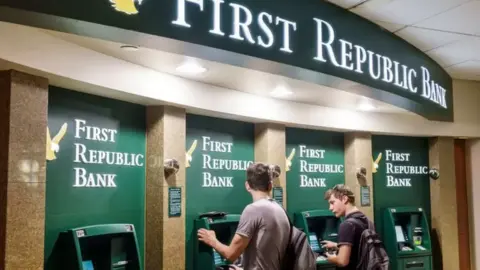 Getty Images People at First Republic ATMs