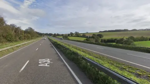 Pedestrian seriously injured in A38 hit and run