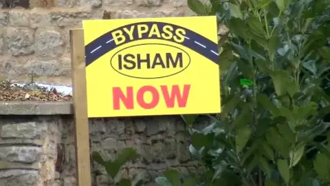 Isham bypass sign