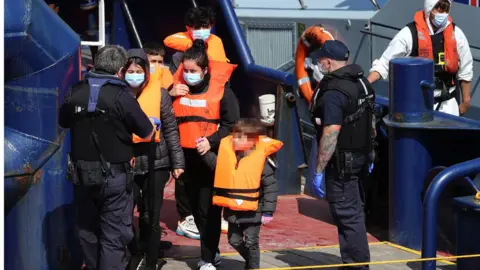 PA Media Children arriving at Dover