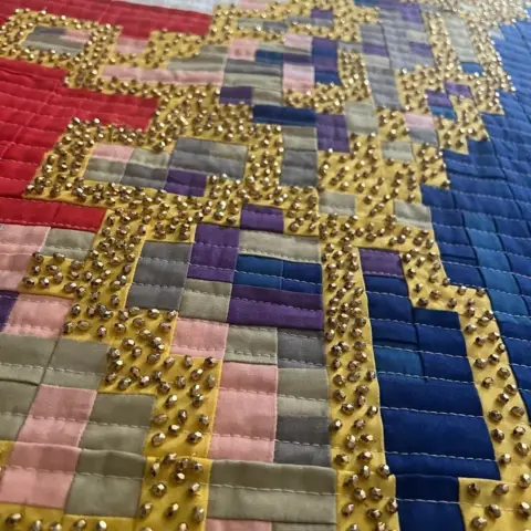 Devida Bushrod Beads on the quilt