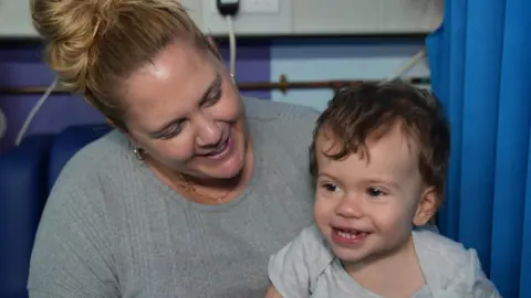 John Fairhall/BBC Cheryl and Archie