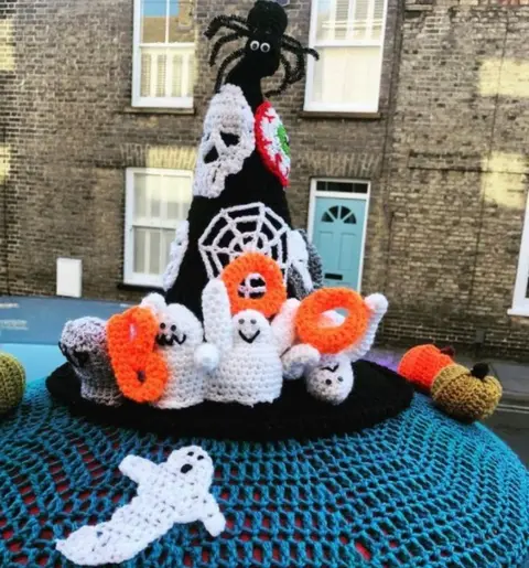 The Secret Yarn Bomber Ely postbox topper