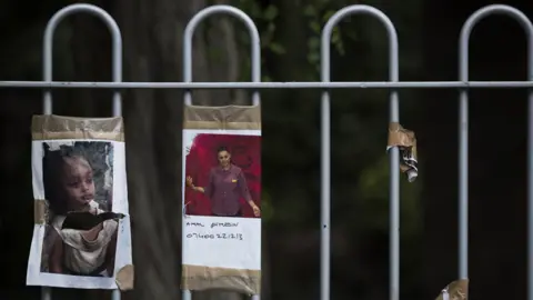 Getty Images Missing people signs remain around the site of Grenfell Tower on July 12, 2017 in London, England.