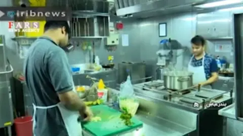 Irib Cooks in the kitchen of the Stena Impero