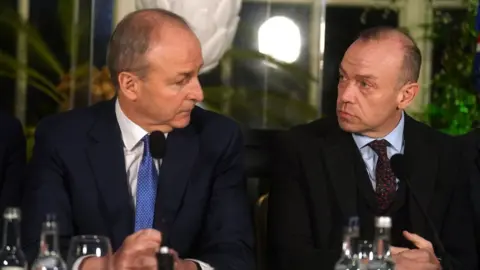 PA Media Micheál Martin and Chris Heaton-Harris