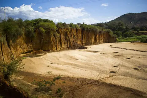 BBC What used to be a river in Makueni is now a gaping hole with steep cliffs