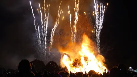 Getty Images Fireworks and bonfire