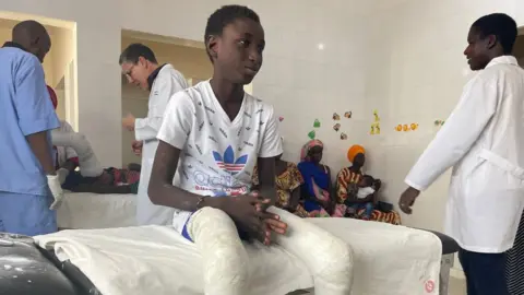 BBC Serigne in full leg plaster