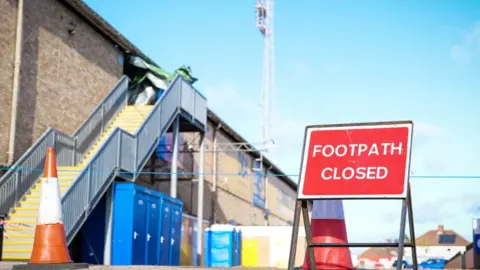 Cambridge United Cordon outside football stadium