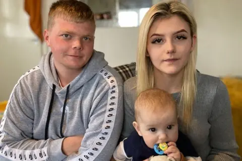 BBC A couple with a baby