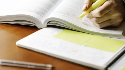 Getty Images Marking work