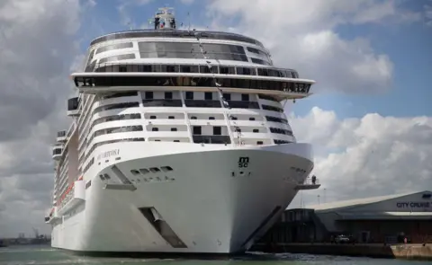 PA Media The MSC Virtuosa pictured front the front on a clear day, while docked in Southampton in May 2021