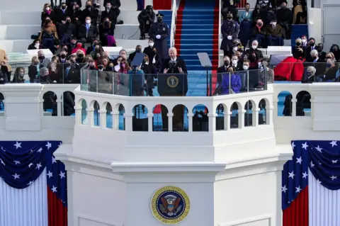 Rob Carr / Getty Images President Biden gives his inaugural speech