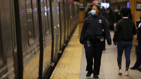 Getty Images NYPD officer at subway station